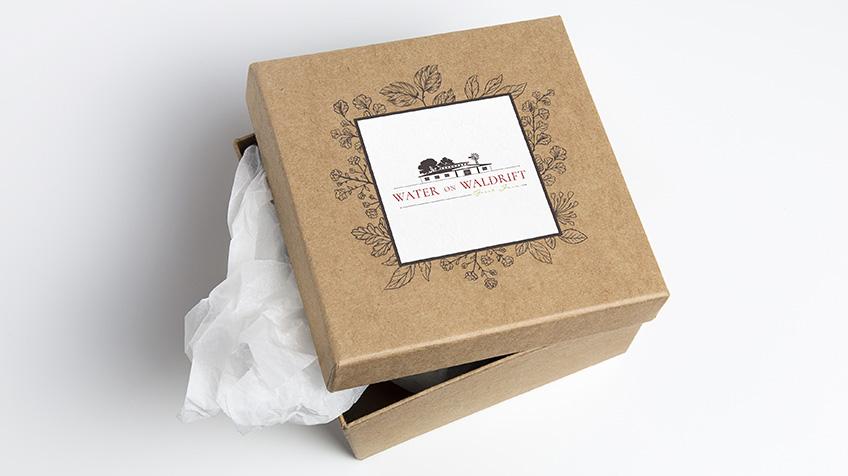 wow guest farm vereeniging logo design cardboard