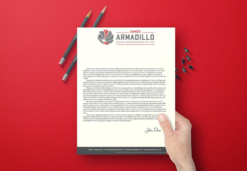 armed armadillo letterhead design